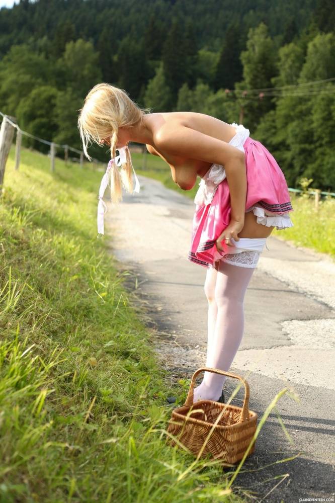 Sweet young Tirol in pigtails pauses with her basket to masturbate outdoors | Photo: 866102
