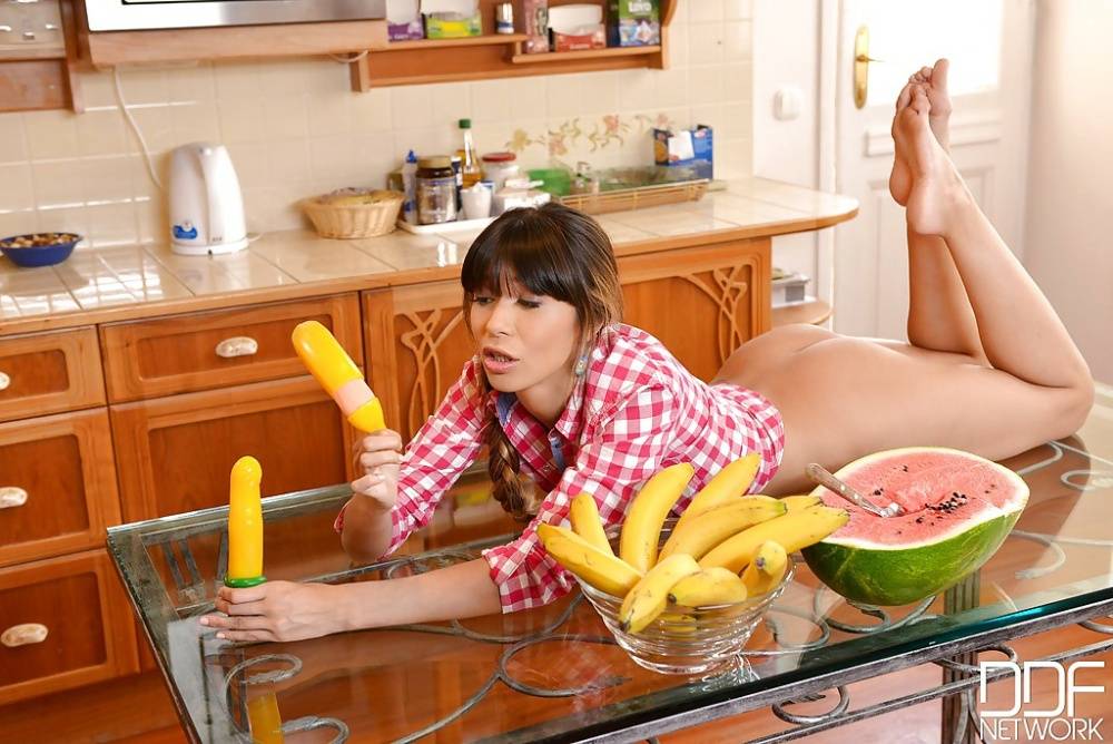 Beautiful and barefoot European teenager Mona Kim masturbating in kitchen - #11