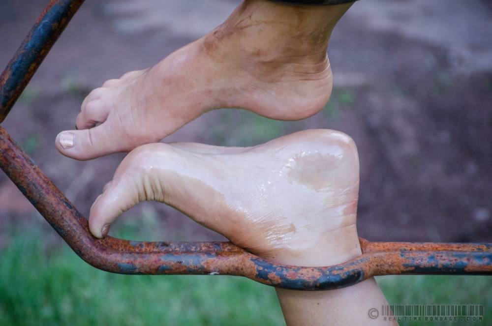 Female slave London River is restrained in a variety of ways in a yard - #2