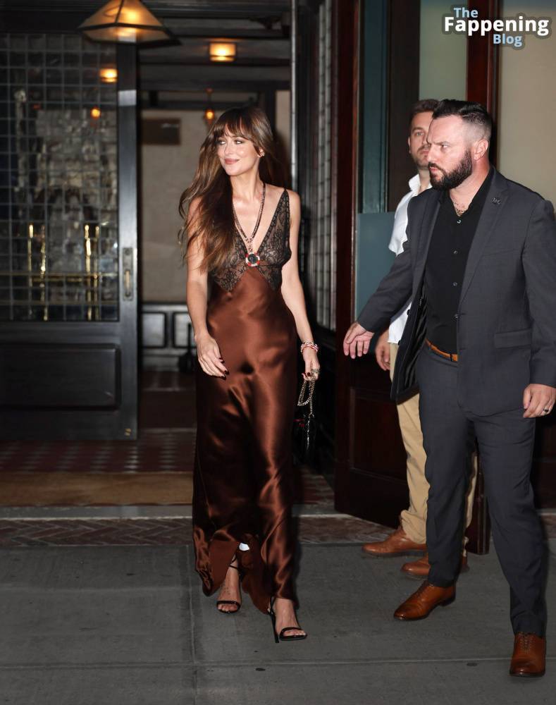 Dakota Johnson Stuns in a Copper Silk Gown Leaving Her Hotel in NYC (29 Photos) - #11