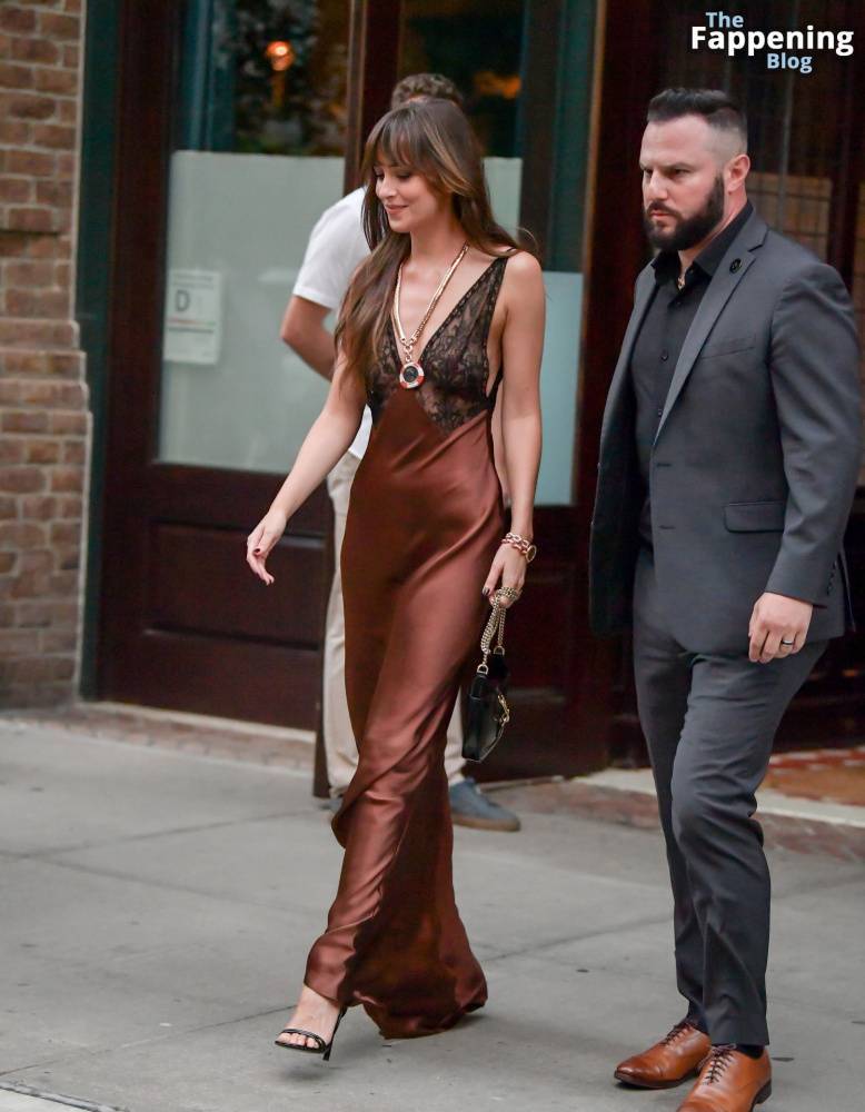 Dakota Johnson Stuns in a Copper Silk Gown Leaving Her Hotel in NYC (29 Photos) - #15