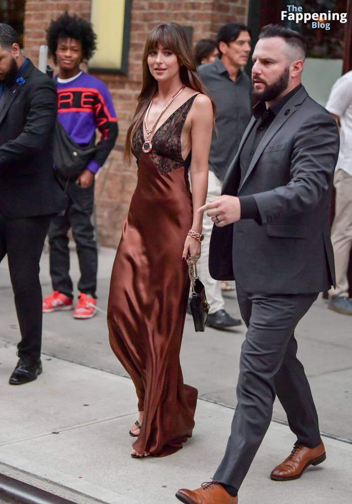 Dakota Johnson Stuns in a Copper Silk Gown Leaving Her Hotel in NYC (29 Photos) - #22