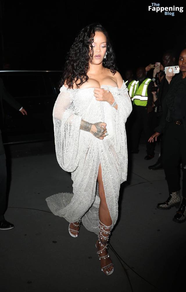 Rihanna Displays Her Curves in a White Dress (13 Photos) - #12