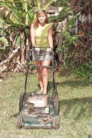 Curvy May Malani gets horny mowing the lawn so she gets naked. - #main