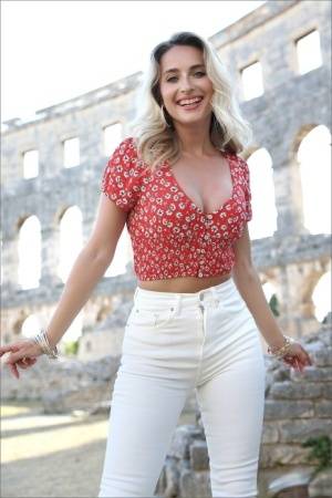 Dirty blonde poses at the Colosseum for a safe for work modelling gig - #main