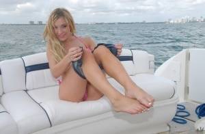 Lusty blonde Amy Brooke strips bikini and rubs pussy on the boat - #main