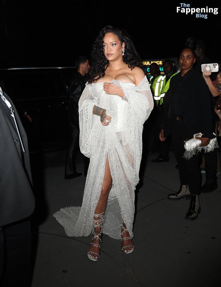 Rihanna Displays Her Curves in a White Dress (13 Photos) - #main