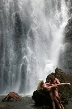 Stunning milf Jesse Jane fucks outdoor in the waterfall on cam on realgirlsweb.com