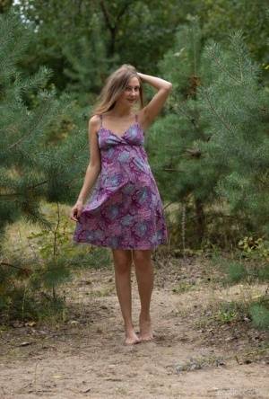 Lenta exhibits her beauty in the forest like a wild flower on realgirlsweb.com