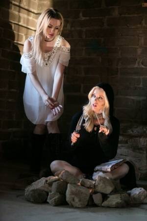 Fully clothed teens Dahlia Sky and Charlotte Stokely model in cosplay garb on realgirlsweb.com