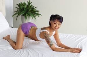 Tattooed Asian girl Saya Song has POV sex with a big white cock on realgirlsweb.com