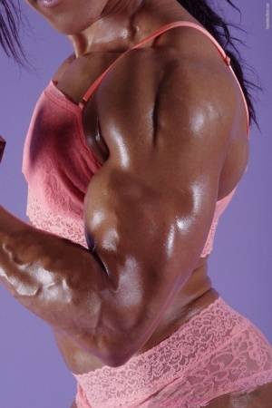 Female bodybuilder Karen Garrett flexes her muscles in lingerie on realgirlsweb.com