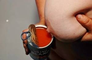 Big titted amateur Juicey Janey pours a can of pasta on her naked body on realgirlsweb.com