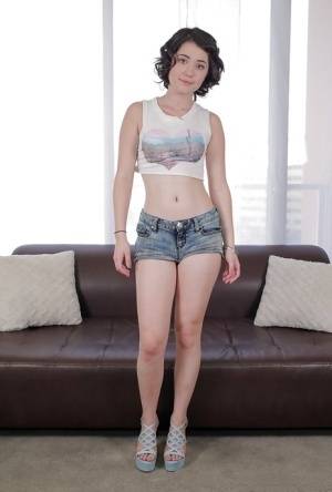 Amateur chick Cadence Carter posing in denim shorts for casting couch on realgirlsweb.com