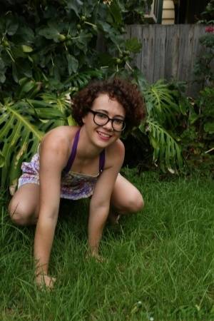 Geeky girl Rosie wears her glasses for her nude debut on the back lawn on realgirlsweb.com