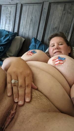 Overweight amateur Busty Krisann poses in the nude around her home on realgirlsweb.com