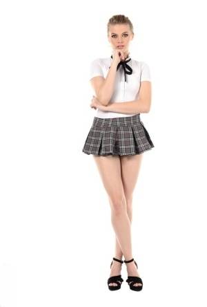 Leggy girl Sophie Sparks peels off her school uniform to masturbate on realgirlsweb.com
