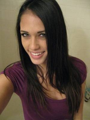 Skinny girl Tiffany Thompson takes nude selfies in a bathroom mirror on realgirlsweb.com