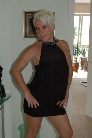 Blonde mature Claudia stipping out of a black dressAmateur,Mature,Stripping on realgirlsweb.com