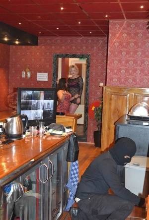 Amateur chick Kimberly Scott and a girlfriend disrobe a hooded male robber on realgirlsweb.com