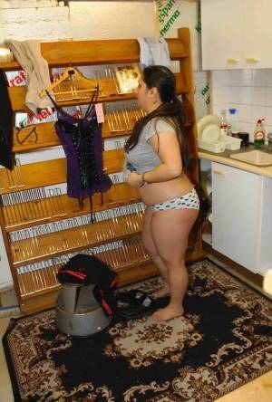 Fat amateur Kimberly Scott changes into lingerie inside a XXX store on realgirlsweb.com